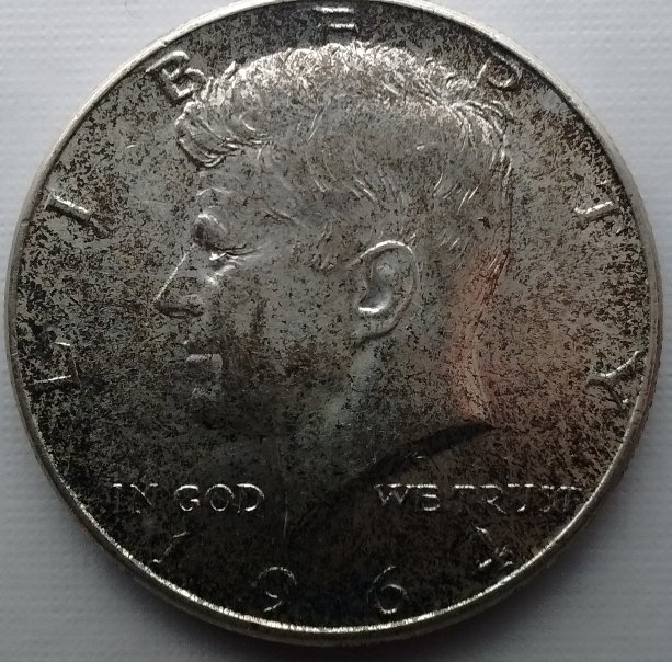 1964-Kennedy-50-Cent.-Whats-The-Black-All-Over-It-?